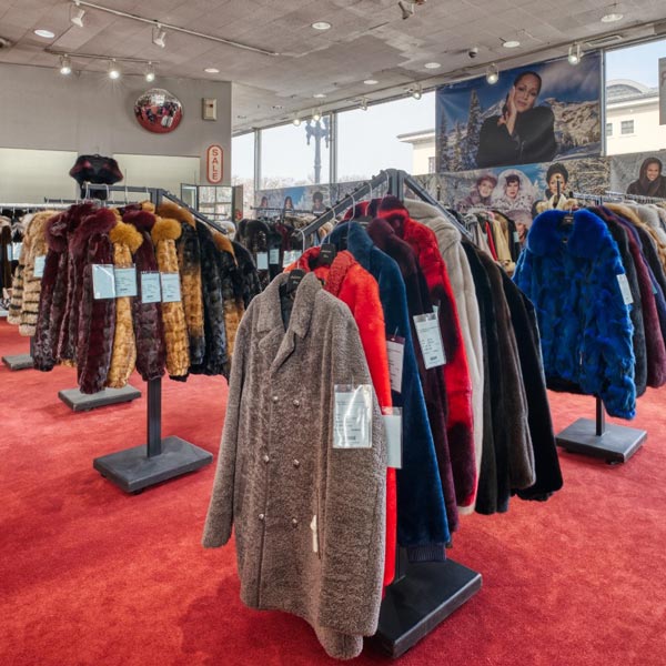 fur coats on store rack